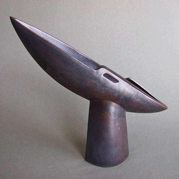 flying boat shaped sculpture, black glaze