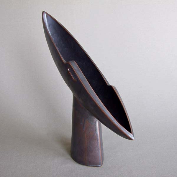 flying boat shaped sculpture, black glaze