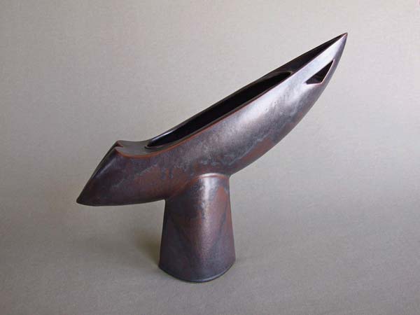 flying boat shaped sculpture, black glaze
