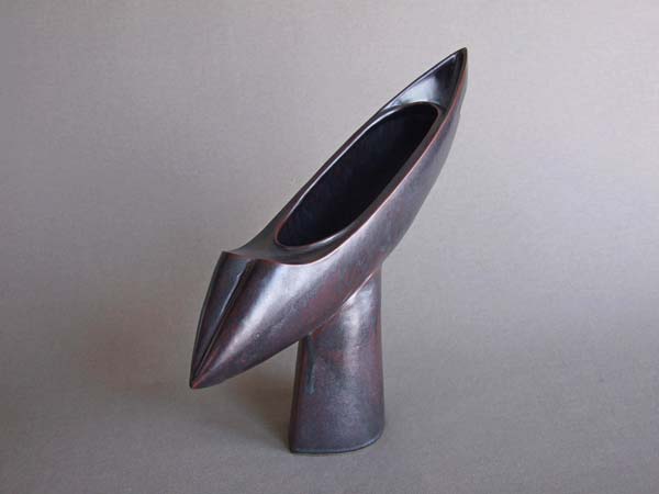 flying boat shaped sculpture, black glaze